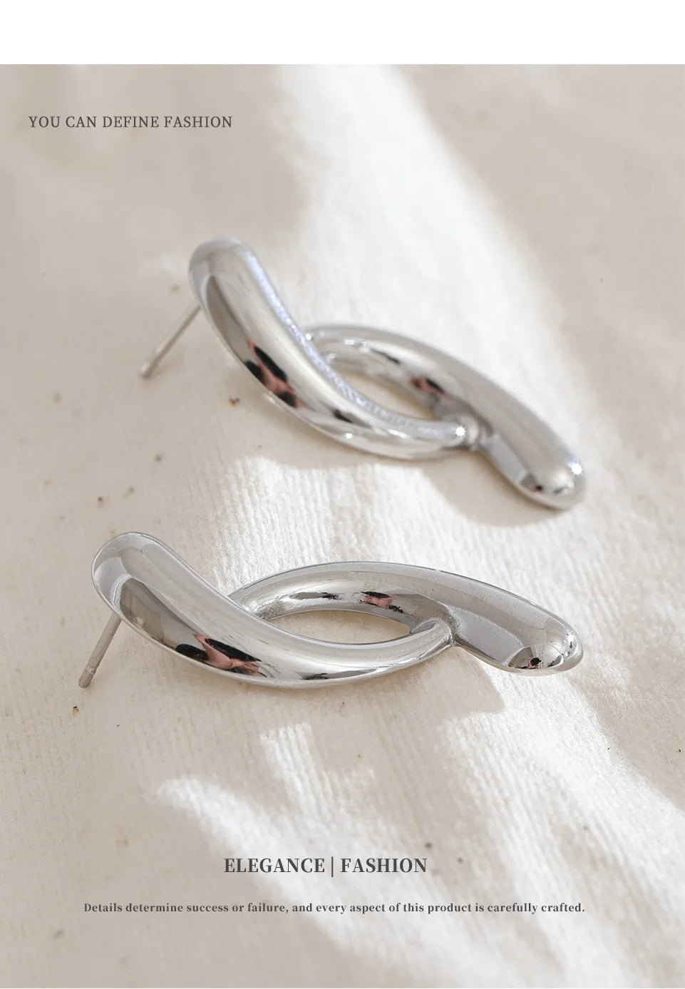Sculptural Silver Twist Earrings
