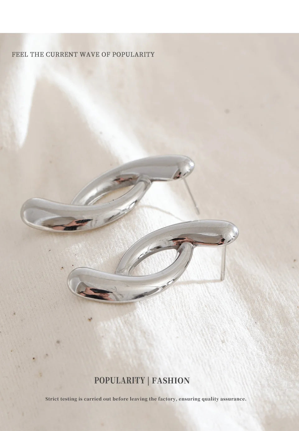 Sculptural Silver Twist Earrings