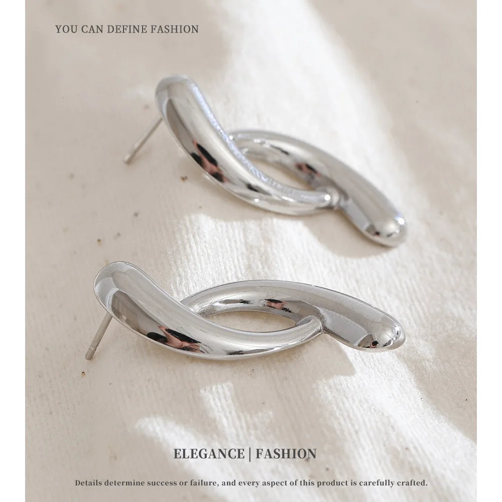 Sculptural Silver Twist Earrings